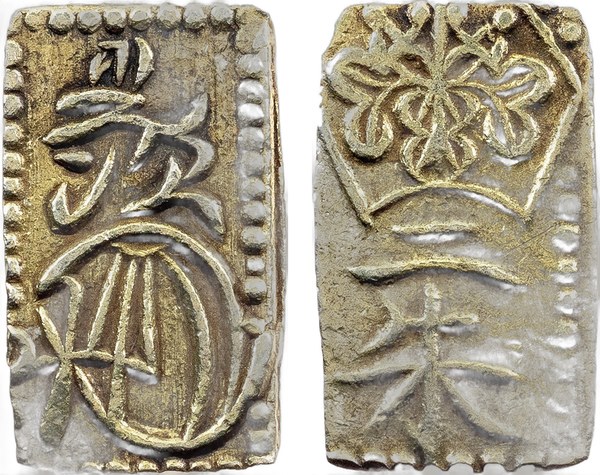 Japonská obdélníková mince dvoušu (nišuban) z let 1860–1869 s paulovniovým erbem
