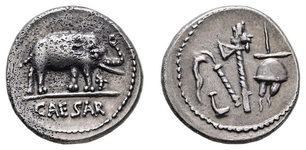 Stříbrný denár Julia Caesara se slonem a nápisem CAESAR a s kněžskými symboly na druhé straně, 49–48 př. n. l.